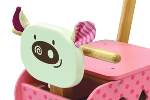 Lauflernwagen als lustiges Schweinchen mit weichen Ohren.